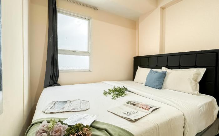 Basic 2BR Apt at Green Palm Residence By Travelio