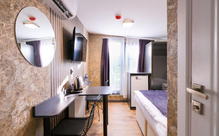 Cozy City Nest with Private Balcony