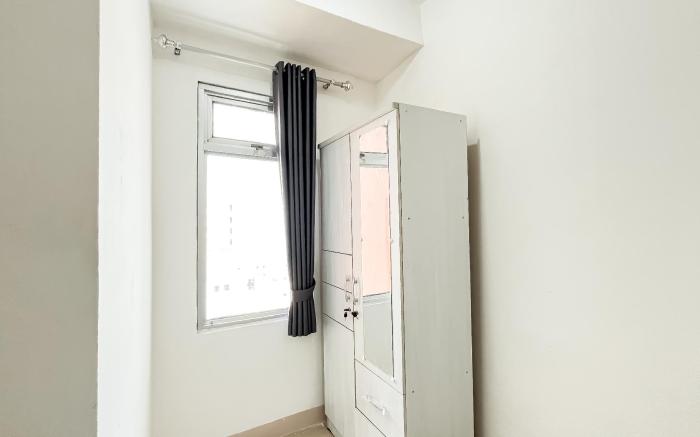 Basic 2BR Apartment at Green Bay Pluit By Travelio