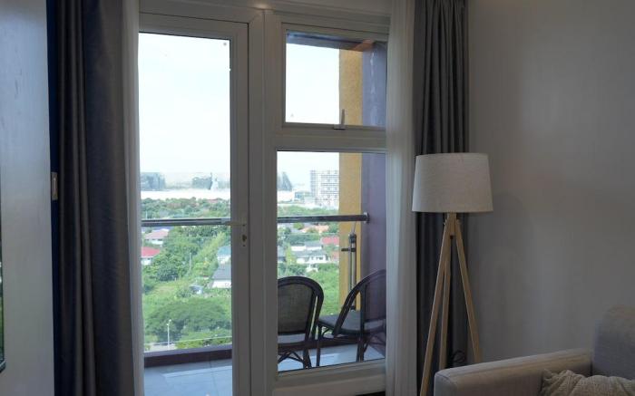 Cozy 1BR with Infinity Pool & Gym