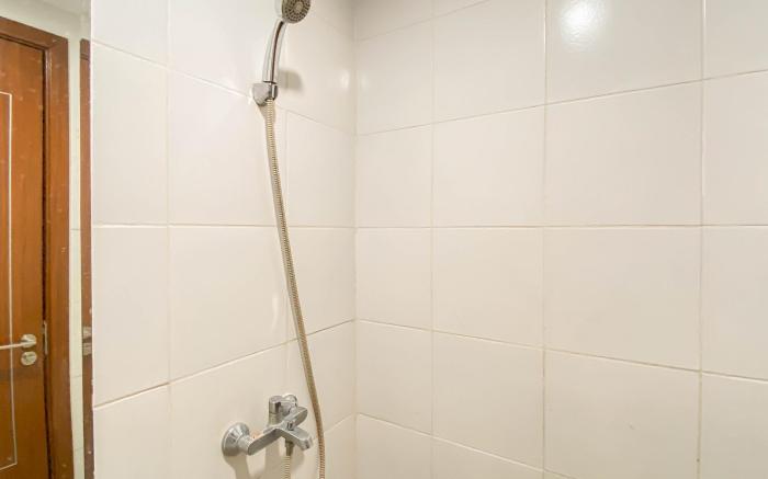 Basic 1BR Apartment Vittoria Residence By Travelio