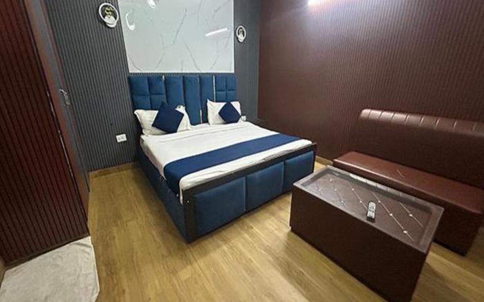 FabHotel Happy Residency