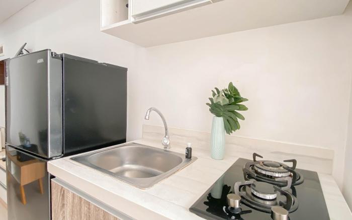 Basic 1BR at Vittoria Residence Apart By Travelio