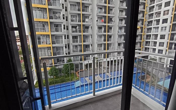 Queen Studio with Balcony by ComfyAsia