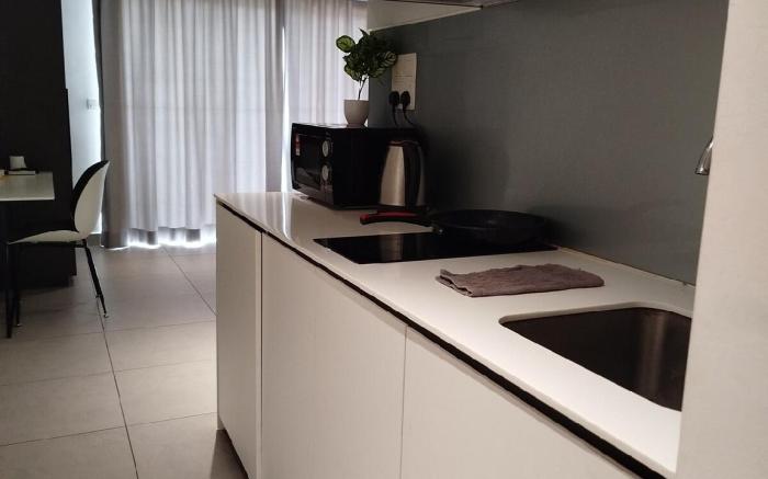 Comfy Queen Studio with Balcony by ComfyAsia