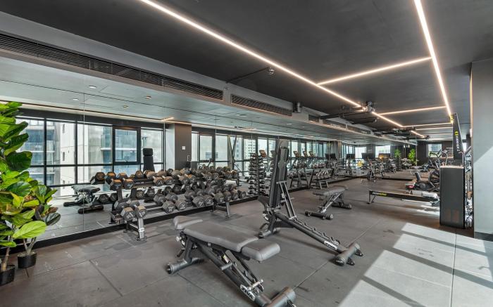 2-Bed Inner-City Pad with Pool, BBQ & Gym