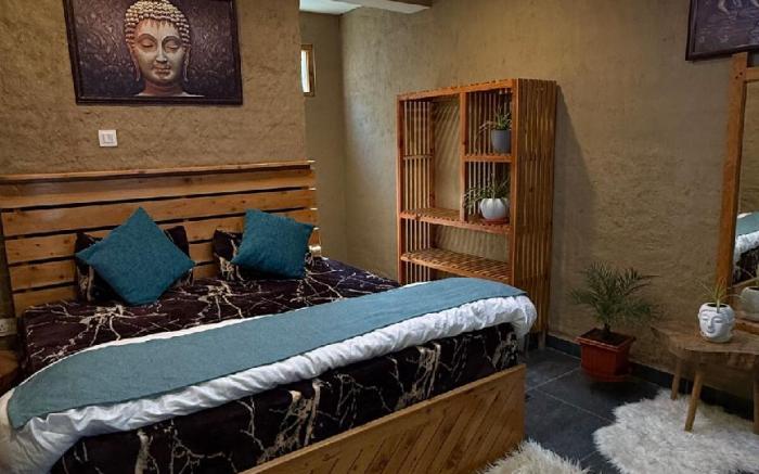 Mudhouse room with valley view