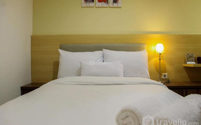 Modern 1BR @ Cinere Bellevue Apartment By Travelio