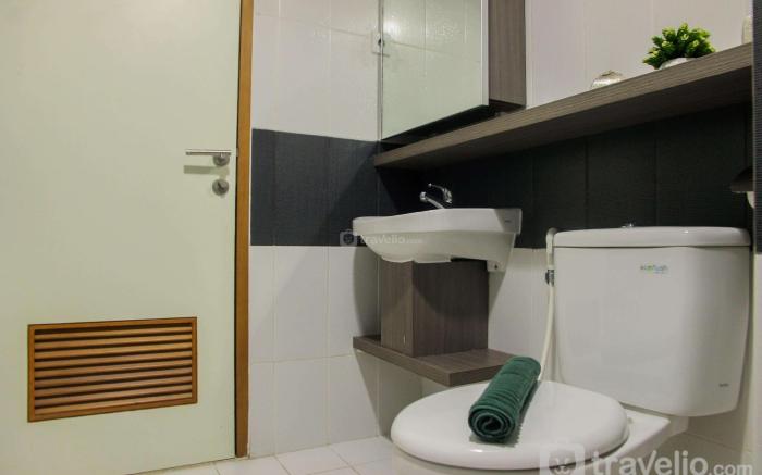 Modern 1BR @ Cinere Bellevue Apartment By Travelio