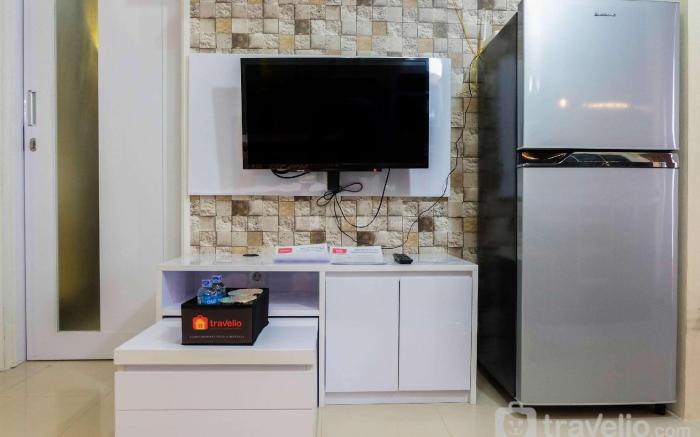Modern 2BR with City View at Bassura Apartment By Travelio