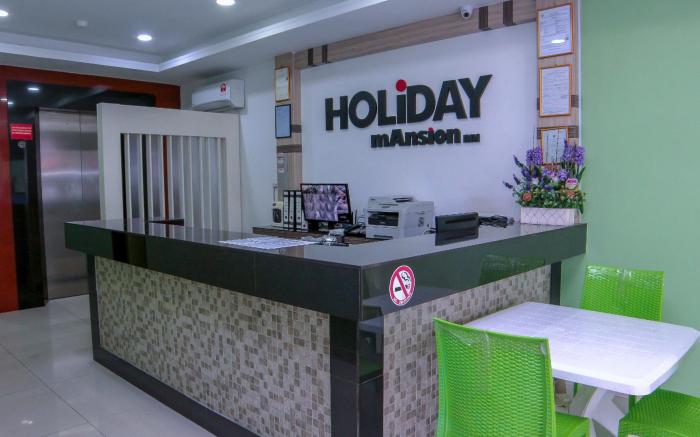 SUPER OYO 44054 Holiday Mansion Inn