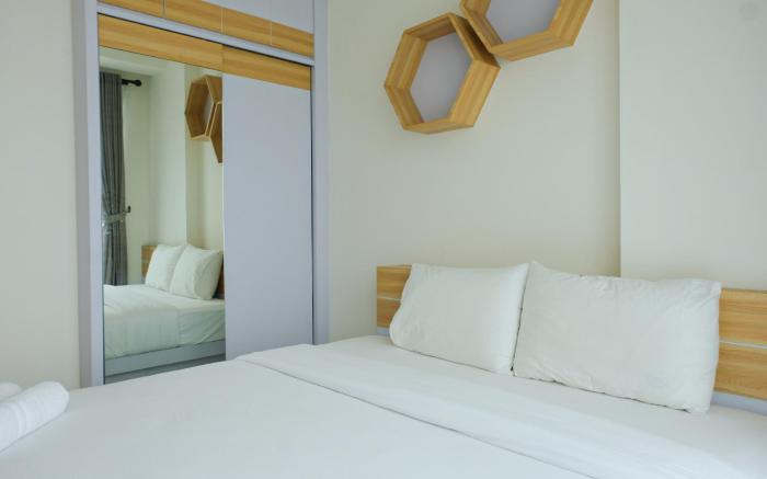 Compact 1BR at Tree Park Apartment By Travelio