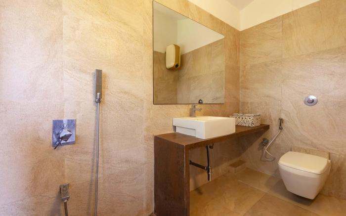 StayVista's Santoni Farms - Riverside Bliss with Pool, Orchard & Activities