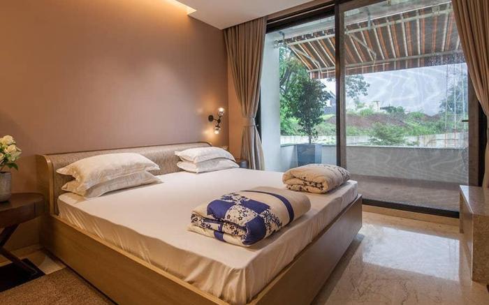 Villa 41 by StayVista - A chic retreat with a pool, poker table, and a theater room