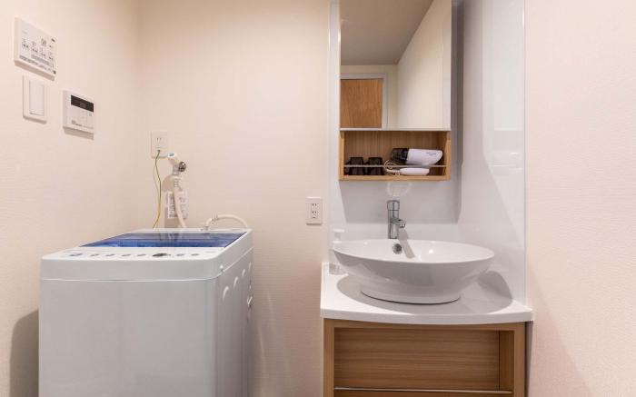 Mr.KINJO in front of Manza Beach