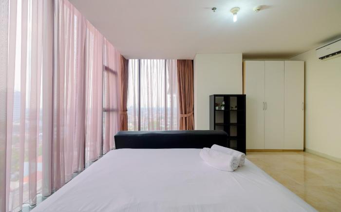 Relaxing 1BR Apt at L'Avenue Pancoran By Travelio