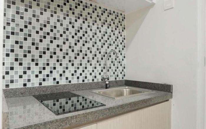 Minimalist Studio Apt at Taman Melati By Travelio