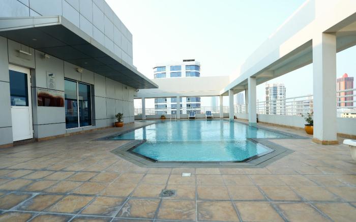 OYO 104 Q House 3 Apartments
