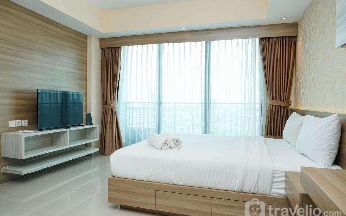 Cozy Studio Apartment @ Nine Residence By Travelio