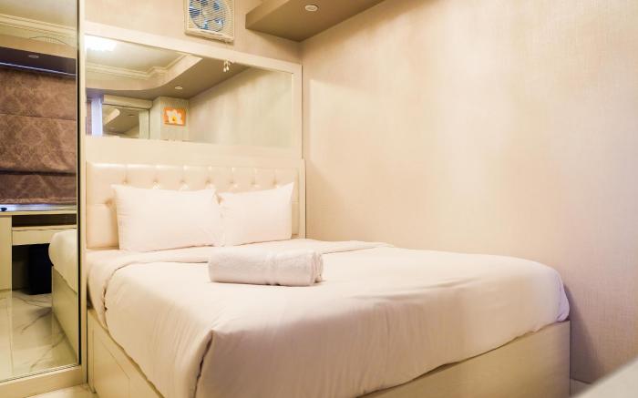 Posh 2BR Apartment at Bassura City By Travelio