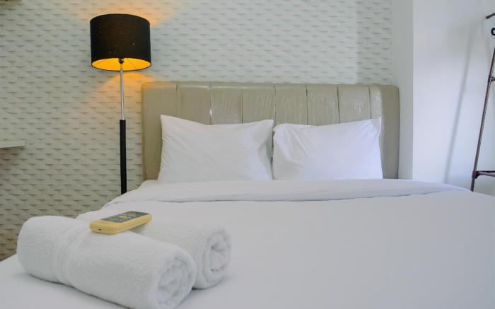 Spacious 2BR Green Bay Pluit Apartment By Travelio