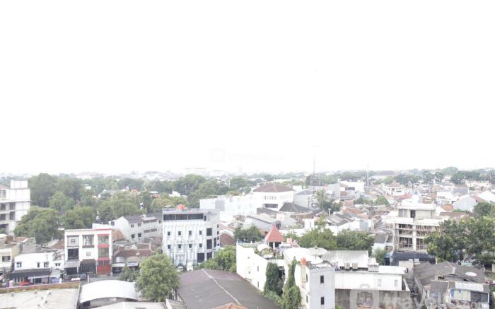 Comfy 2BR Grand Asia Afrika Apartment By Travelio