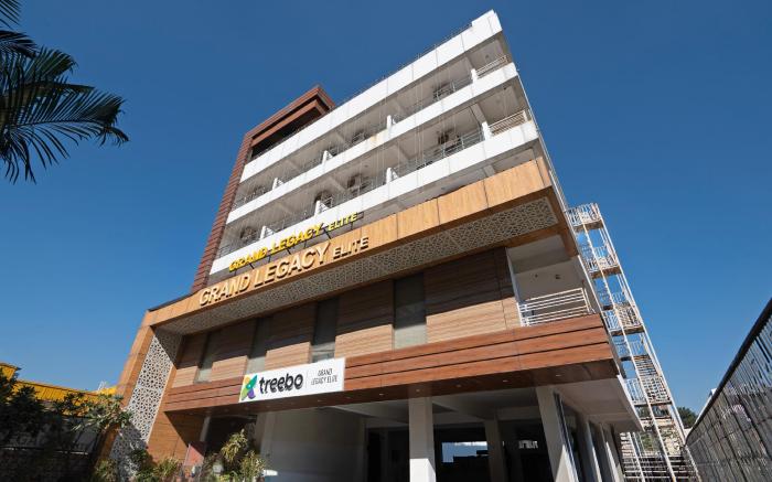 Treebo Grand Legacy Elite With Roof Top Cafe