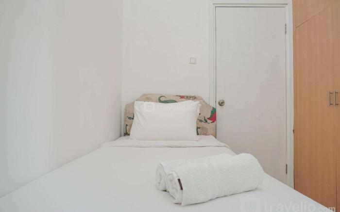 Fully Furnished with Comfortable 2BR Grand Palace Kemayoran Apartment By Travelio
