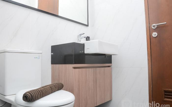 Modern 1BR at Ciputra World 2 Apartment By Travelio