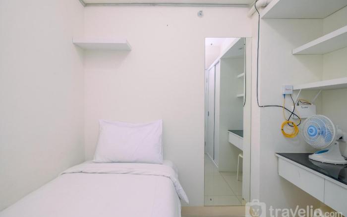 Relaxing 2BR at Green Pramuka Apartment By Travelio