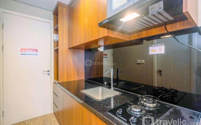 Modern and Compact Studio at Patraland Urbano Apartment By Travelio