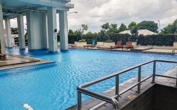 Cozy Living 1BR at Pakubuwono Terrace Apartment By Travelio