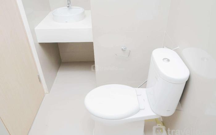 Comfy Minimalist Studio Tree Park BSD By Travelio
