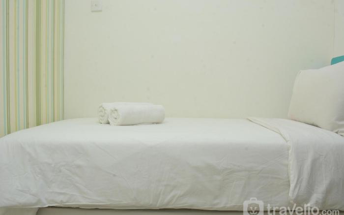Strategic 2BR Bassura City Apartment By Travelio