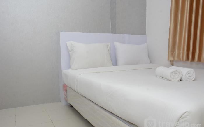Strategic 2BR Bassura City Apartment By Travelio