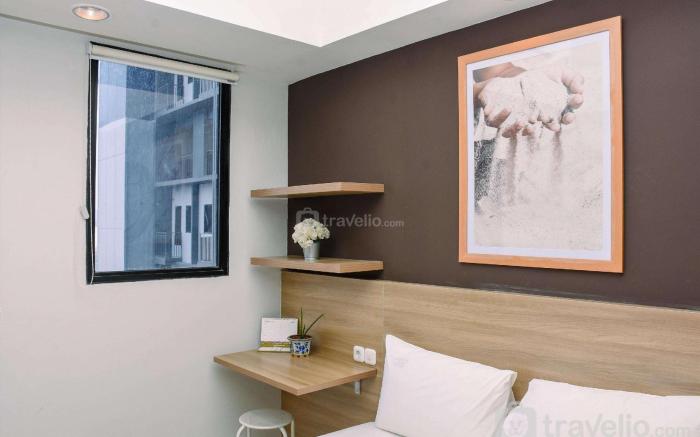 Comfy Studio at Evenciio Apartment By Travelio