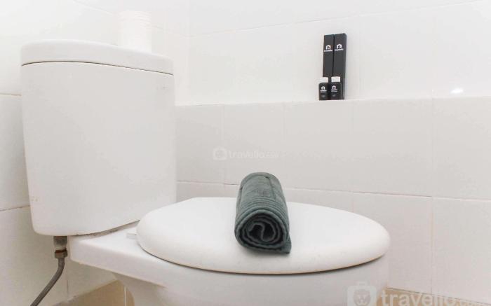 Cozy Studio at Bassura City Apartment By Travelio