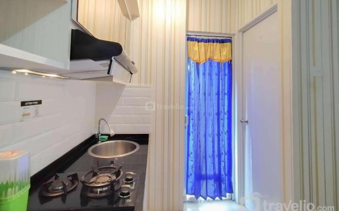 Nice and Cozy Studio at Bassura City By Travelio