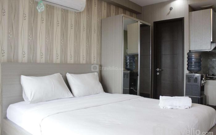 Cozy Studio at Apt Mekarwangi Square By Travelio