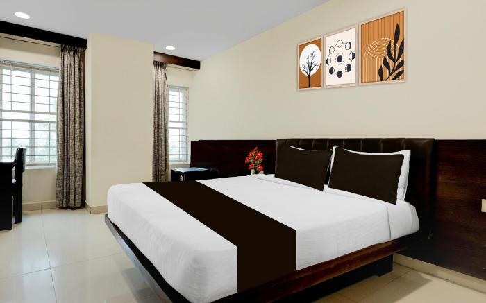 Super Townhouse Oak Vijayawada Formerly Madhuvan Grand