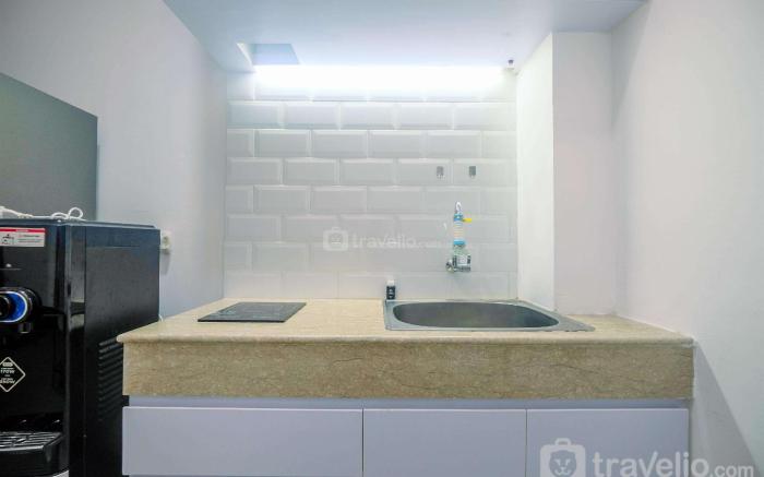 Comfort 1BR at Evenciio Margonda By Travelio