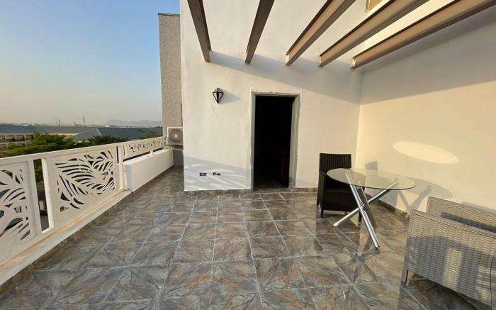 SUNSET VIEW CONDO@UTAKO+WIFI+24HRs AC & GENERATOR