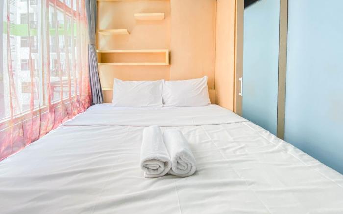 Homey Living 2BR at Jarrdin Cihampelas By Travelio