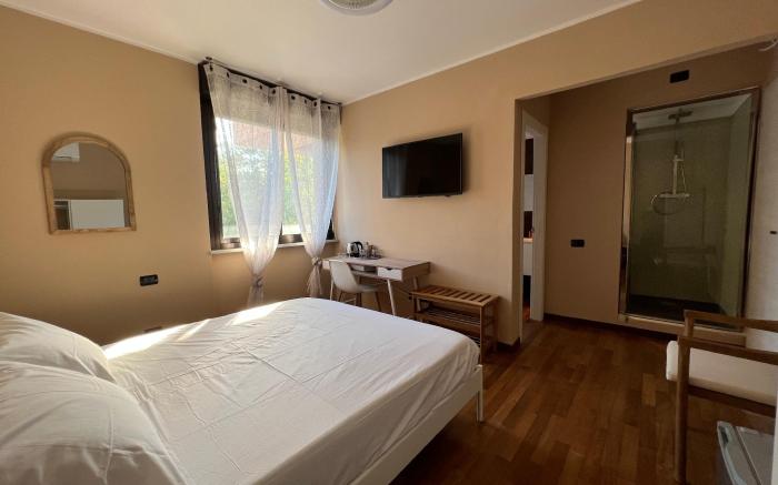 Camera doppia con bagno privato e terrazzino
