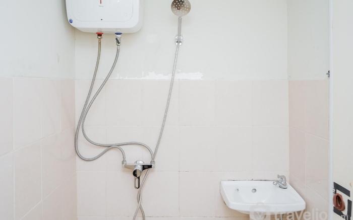 Homey Studio at Green Palm Residence By Travelio