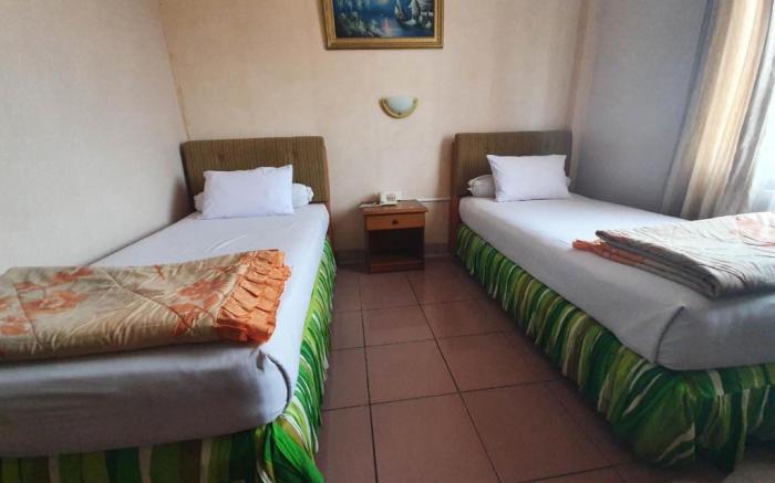 OYO 91424 Belfano Guest House