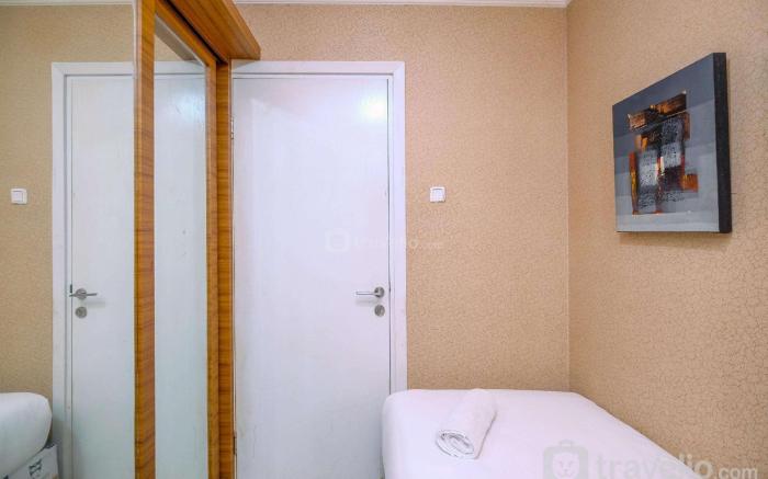 Comfy 2BR Green Pramuka City Apartment By Travelio