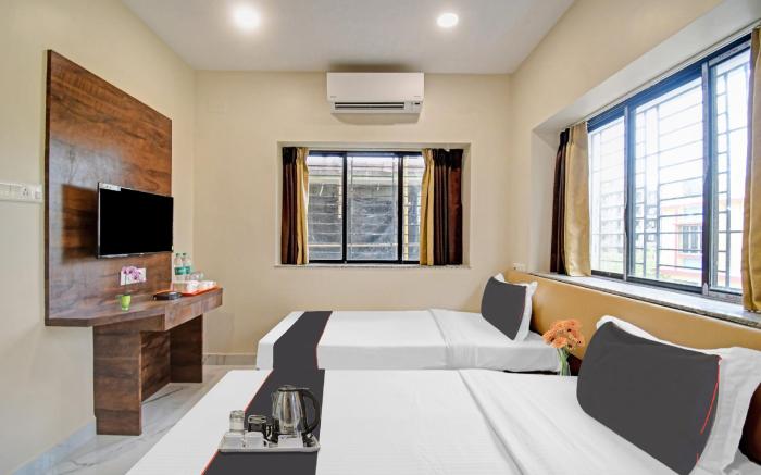 Capital O Hotel Dak Plaza