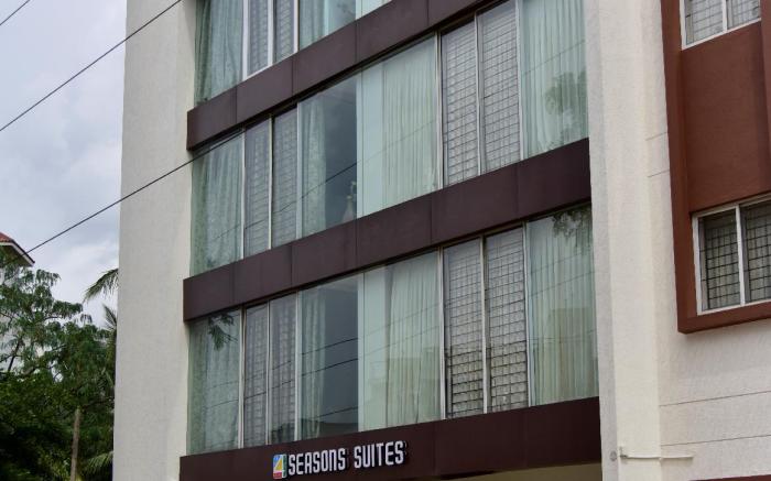 SEASONS SUITES 