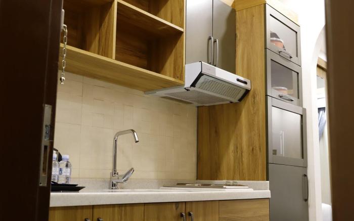 Elite Home Suites  بيت النخبة للأجنحة الفندقية  
